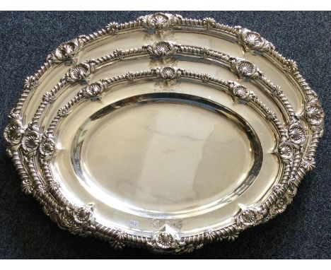 PAUL STORR: A very fine and rare large suite of three George III silver serving dishes of typical form. London 1811. Approx. 