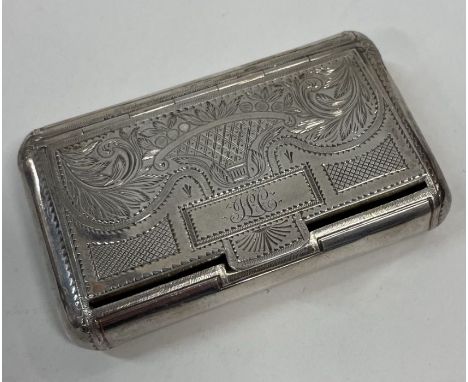 An early 19th Century French silver engraved hinged snuff box. Approx. 64 grams. Est. £80 - £100.