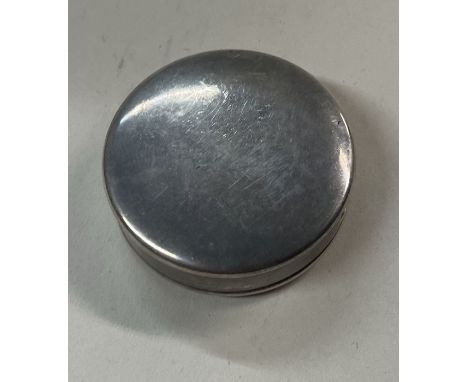 An English silver tape measure. London 2000. Approx. 18 grams. Est. £30 - £50.