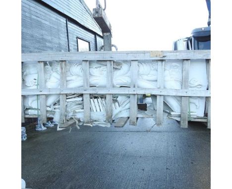 A pair of large and ornate white marble architectural arches, each decorated with cherubs and scrolls, each 250cm wide (2)