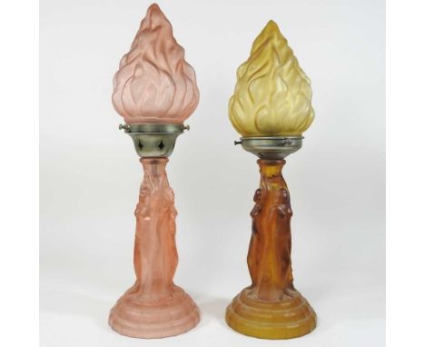 An Art Deco coloured pressed glass figural oil lamp, 46cm high, together with another similar, 44cm highCondition report: Bot