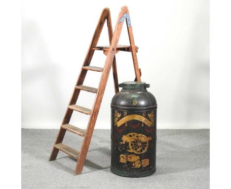 A large 19th century painted metal canister, inscribed Parnall and Sons Bristol, 81cm high, together with a vintage wooden st