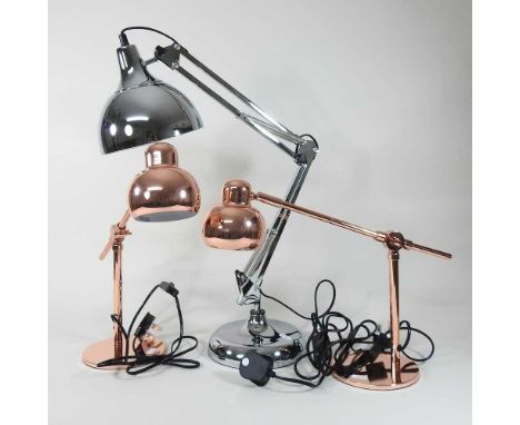 A pair of copper adjustable lamps, 35cm high, together with a chrome lamp similar (3)