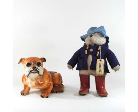 A Gabrielle designs Paddington bear, 52 cm high, together with a painted plaster model of a bulldog (2)