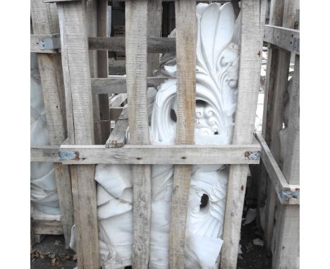 A pair of large marble architectural brackets, each with carved acanthus decoration, 70 x 123cm