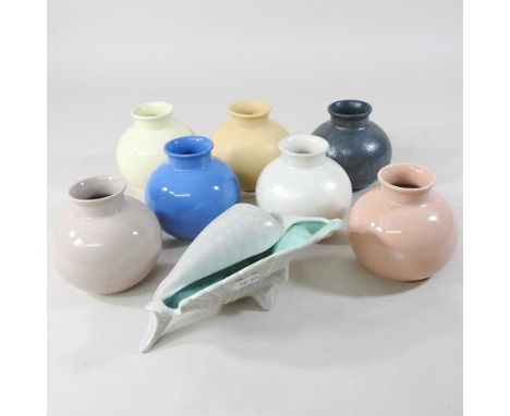 A collection of various Poole pottery vases, 10cm high, together with a Poole pottery shell77w x 50d x 77h cm