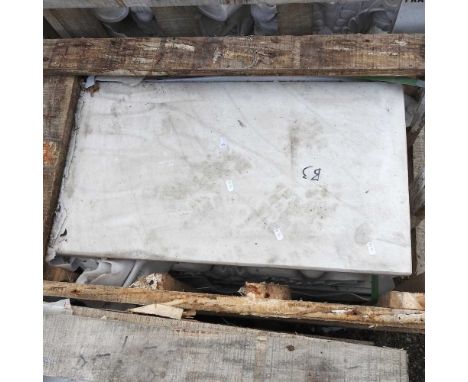 A large carved white marble architectural pedestal, with carved decoration76w x 41d x 45h cm