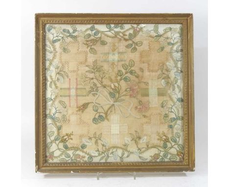 A George III needlework sampler, worked with flowers by EW and HW dated 1798, 37 x 37cmCondition report: Overall colour is ye