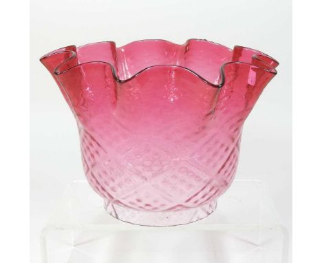 A red glass oil lamp shade, of frilled shape, with mottled decoration, 14cm highCondition report: Dirty, with fine chips arou