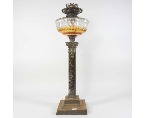 A 19th century simulated marble oil lamp base, with a cut glass reservoir and Jones Bros, Holloway burner, 56cm highCondition