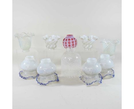 A pair of opaline glass light shades, with swirled decoration and frilled rims, two inch aperture, together with a collection