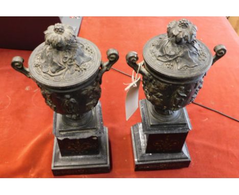 French 1880s Mantle urns - a matching pair of decorative antique w/m Medici style urns, sat upon black marble bases with scro