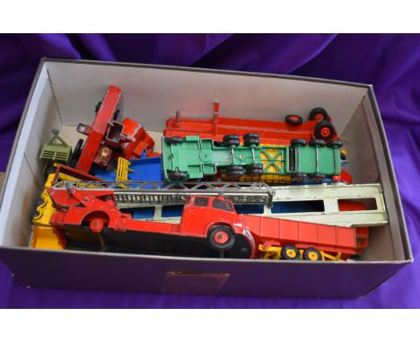 A box of large play worn Dinky, Lesley, Matchbox, Corgi etc., transformers, fine engine, tractors etc.