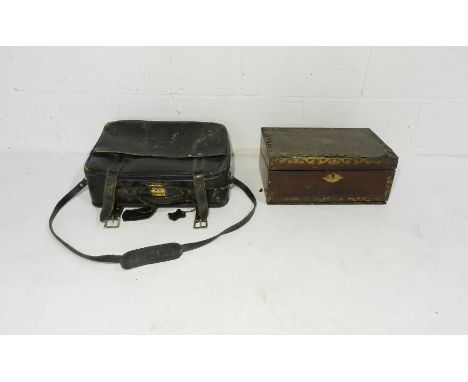 A Victorian writing slope with brass detailing (A/F) along with a vintage leather case