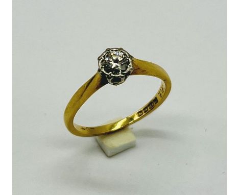 An 18ct gold diamond solitaire ring