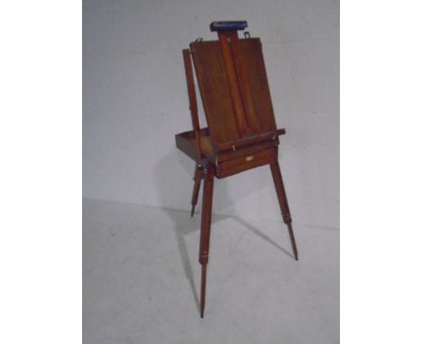 A wooden travelling field easel