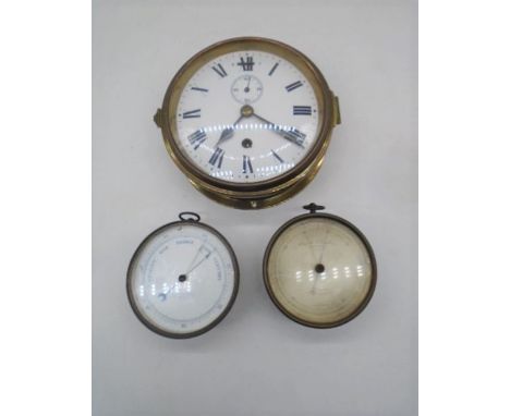 A Negretti and Zambra, London barometer along with a brass ships clock and a barometer by R F McCaulay.  