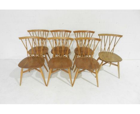 A set of seven Ercol blonde lattice back (model 376) dining chairs - 1 A/F