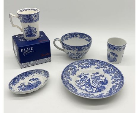 A collection of Spode Blue Room china including oversized teacup and saucer along with three blue and white ceramic egg decor