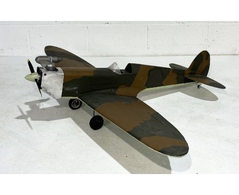 A vintage hand built radio controlled model of a Spitfire, wingspan 140cm, no controller present 