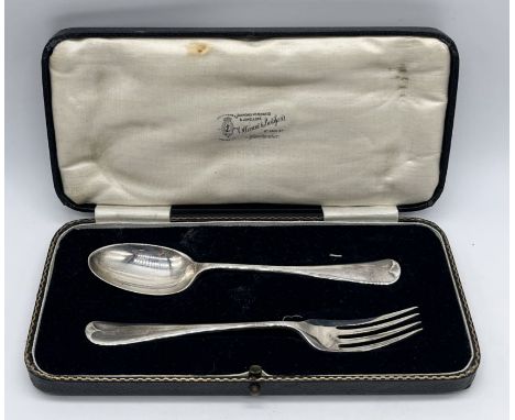 A cased silver Christening set consisting of fork and spoon
