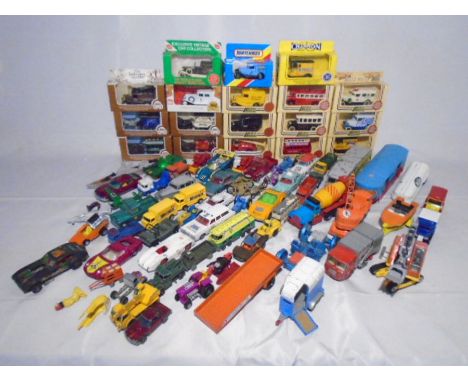 A collection of boxed and unboxed die-cast vehicles including Lledo Days Gone, Lledo Eastenders Collection, Dinky Toys, Match