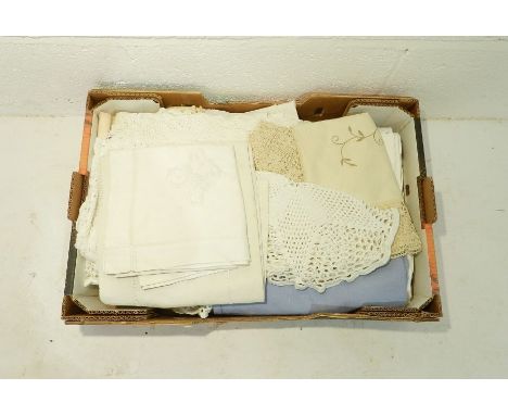 A quantity of vintage linens and fabrics