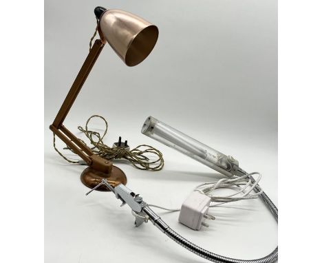 A copper and wood Anglepoise style lamp along with a desk top light by The Daylight Company 