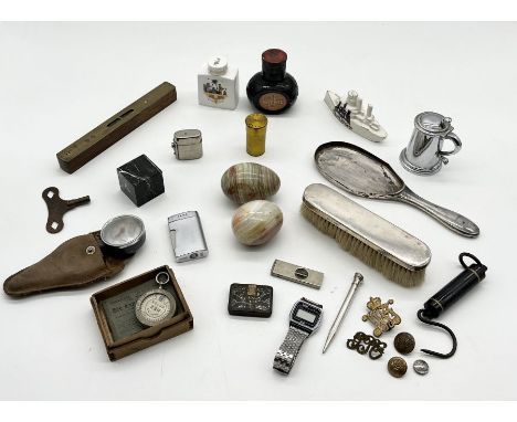 A collection of various items including novelty Dunhill lighter in the form of a tankard, Bee meter, Silver brush and mirror 