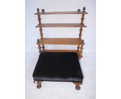 A waterfall hanging shelf with turned supports and acorn finials along with a foot stool.