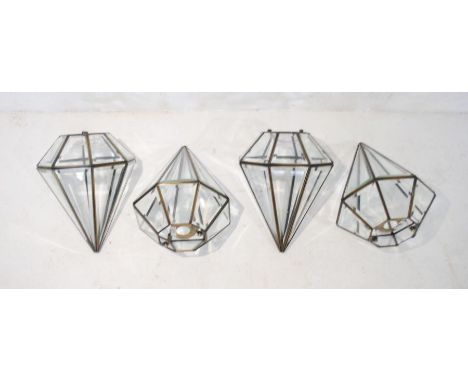 A set of four modern glass octagonal diamond shaped pendant light fittings