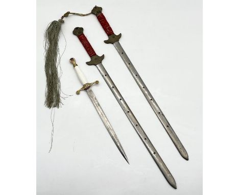 Two Eastern swords along with a Wilkinson dagger 