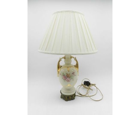 A classical design table lamp with brass base