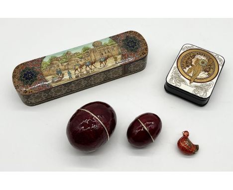 An Eastern Khatam marquetry pen box, an Art Deco style box with Mucha image to top and nesting enamel eggs