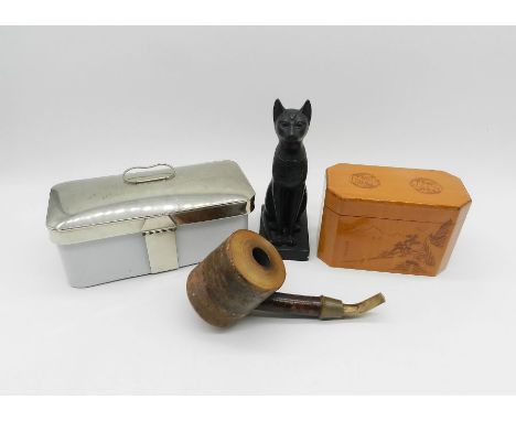 An oriental tea caddy along with a cherry wood pipe, a vintage lunch box and an Egyptian cat