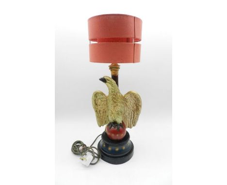 A table lamp with painted metal base in the form of an eagle - total height 59cm
