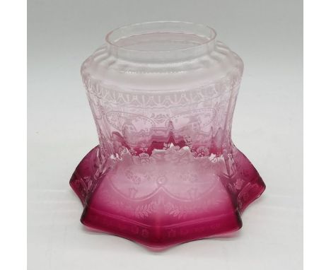 A Victorian cranberry oil lamp shade