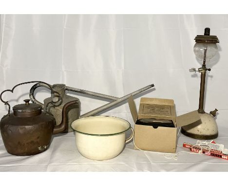 A collection of various items including Tilley lamp, galvanised watering can, child's gas mask, enamel pot etc. 