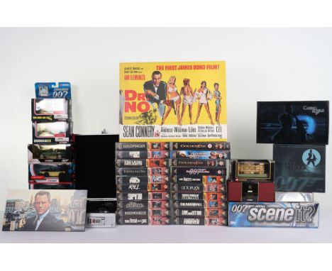 A Quantity of James Bond Collectibles, including:  Corgi Attache Case, 2 x GE Fabbri James Bond Cars Aston Martin DB 5 & Asto