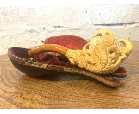 A late 19th c.  meerschaum pipe in the form of a dragon's claw holding and egg, in original travelling case 16cm x 7cm