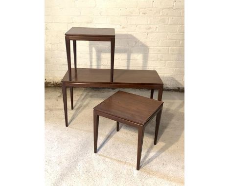 A Vintage mid century teak nest of three tables, each raised on square tapered supports H44cm, W85cm, D38cm