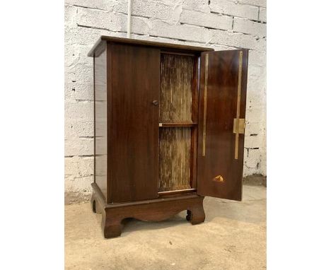 A mahogany LP cabinet, first half of the 20th century, two drawers enclosing interior fitted with divisions for 100 records, 