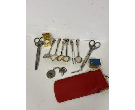 A mixed lot including a set of four teaspoons, with rose handles, each marked Antiko 100 with matching spoon and pickle fork,