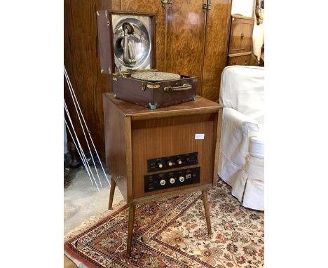 A Whiteley Electrical radio in a mahogany case raised on turned supports, together with a walnut cased manual wind gramophone