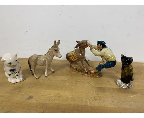 A mixed lot of figures including a Wemyss seated Cat bearing initials GHP to base (9cm), two Beswick Donkeys and a Tweedsmuir