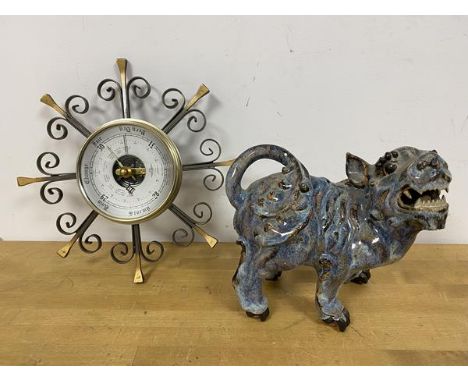 A mixed lot including a ceramic figure of a Chinese lion (17cm), a wall barometer within a stylised sunburst mount (2)