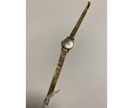 A Tissot lady's wristwatch, the chain link strap marked 750 (17cm)