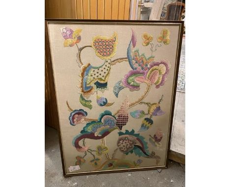 A 1930s embroidered panel depicting scrolling vine with flowers (65cm x 48cm)