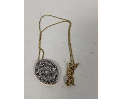 A 10ct gold trace link chain with navette shaped pendant with multiple chip diamonds