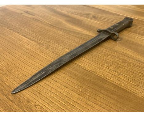 A 1930's Wilkinson bayonet, inscribed Wilkinson London to base of blade on one side with a crown above 35 and W to the other 